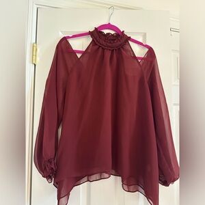 Likely sheer cold shoulder top